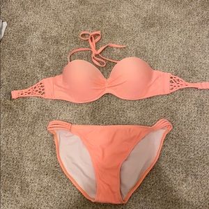 Two piece coral swimsuit.